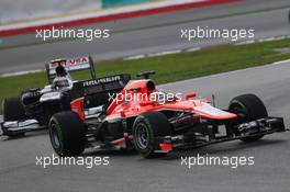 Max Chilton (GBR) Marussia F1 Team MR02 leads Valtteri Bottas (FIN) Williams FW35. 24.03.2013. Formula 1 World Championship, Rd 2, Malaysian Grand Prix, Sepang, Malaysia, Sunday.