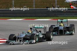 Lewis Hamilton (GBR) Mercedes AMG F1 W04 leads Nico Rosberg (GER) Mercedes AMG F1 W04. 24.03.2013. Formula 1 World Championship, Rd 2, Malaysian Grand Prix, Sepang, Malaysia, Sunday.