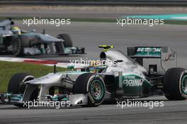 Lewis Hamilton (GBR) Mercedes AMG F1 W04 leads team mate Nico Rosberg (GER) Mercedes AMG F1 W04. 24.03.2013. Formula 1 World Championship, Rd 2, Malaysian Grand Prix, Sepang, Malaysia, Sunday.