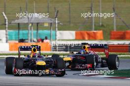 Mark Webber (AUS) Red Bull Racing RB9 leads team mate Sebastian Vettel (GER) Red Bull Racing RB9. 24.03.2013. Formula 1 World Championship, Rd 2, Malaysian Grand Prix, Sepang, Malaysia, Sunday.