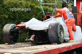 The Ferrari F138 of Fernando Alonso (ESP) Ferrari is recovered back to the pits on the back of a truck. 24.03.2013. Formula 1 World Championship, Rd 2, Malaysian Grand Prix, Sepang, Malaysia, Sunday.