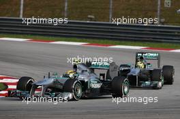 Lewis Hamilton (GBR) Mercedes AMG F1 W04 leads team mate Nico Rosberg (GER) Mercedes AMG F1 W04. 24.03.2013. Formula 1 World Championship, Rd 2, Malaysian Grand Prix, Sepang, Malaysia, Sunday.