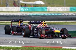 Mark Webber (AUS) Red Bull Racing RB9 leads team mate Sebastian Vettel (GER) Red Bull Racing RB9. 24.03.2013. Formula 1 World Championship, Rd 2, Malaysian Grand Prix, Sepang, Malaysia, Sunday.