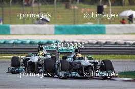 Lewis Hamilton (GBR) Mercedes AMG F1 W04 leads team mate Nico Rosberg (GER) Mercedes AMG F1 W04. 24.03.2013. Formula 1 World Championship, Rd 2, Malaysian Grand Prix, Sepang, Malaysia, Sunday.