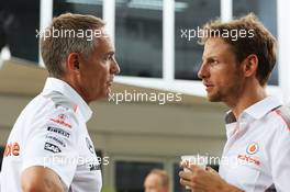 (L to R): Martin Whitmarsh (GBR) McLaren Chief Executive Officer with Jenson Button (GBR) McLaren. 23.03.2013. Formula 1 World Championship, Rd 2, Malaysian Grand Prix, Sepang, Malaysia, Saturday.