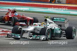 Lewis Hamilton (GBR) Mercedes AMG F1 W04 leads Fernando Alonso (ESP) Ferrari F138. 23.03.2013. Formula 1 World Championship, Rd 2, Malaysian Grand Prix, Sepang, Malaysia, Saturday.