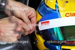 Esteban Gutierrez (MEX) Sauber helmet visor strip is replaced. 23.03.2013. Formula 1 World Championship, Rd 2, Malaysian Grand Prix, Sepang, Malaysia, Saturday.