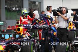 Pole sitter Sebastian Vettel (GER) Red Bull Racing in parc ferme. 23.03.2013. Formula 1 World Championship, Rd 2, Malaysian Grand Prix, Sepang, Malaysia, Saturday.