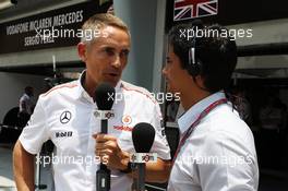 (L to R): Martin Whitmarsh (GBR) McLaren Chief Executive Officer with Alex Yoong (MAL) Star Sports TV Presenter. 23.03.2013. Formula 1 World Championship, Rd 2, Malaysian Grand Prix, Sepang, Malaysia, Saturday.