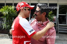 Felipe Massa (BRA) Ferrari with Muhammed Al Khalifa (BRN) Bahrain Circuit Chairman 23.03.2013. Formula 1 World Championship, Rd 2, Malaysian Grand Prix, Sepang, Malaysia, Saturday.