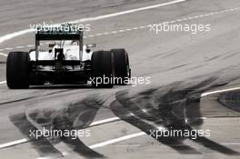Lewis Hamilton (GBR) Mercedes AMG F1 W04 passes tyre marks at the pit exit. 23.03.2013. Formula 1 World Championship, Rd 2, Malaysian Grand Prix, Sepang, Malaysia, Saturday.