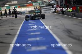 Lewis Hamilton (GBR) Mercedes AMG F1 W04 in the pits. 23.03.2013. Formula 1 World Championship, Rd 2, Malaysian Grand Prix, Sepang, Malaysia, Saturday.