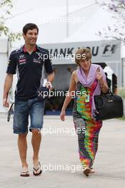 Mark Webber (AUS) Red Bull Racing with partner Ann Neal (GBR). 24.03.2013. Formula 1 World Championship, Rd 2, Malaysian Grand Prix, Sepang, Malaysia, Sunday.
