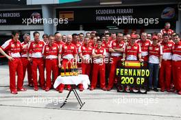 Fernando Alonso (ESP) Ferrari celebrates his 200th GP with the team. 24.03.2013. Formula 1 World Championship, Rd 2, Malaysian Grand Prix, Sepang, Malaysia, Sunday.