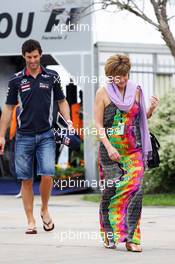 Mark Webber (AUS) Red Bull Racing with his partner Ann Neal (GBR). 24.03.2013. Formula 1 World Championship, Rd 2, Malaysian Grand Prix, Sepang, Malaysia, Sunday.