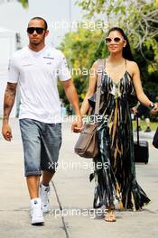 Lewis Hamilton (GBR) Mercedes AMG F1 with his girlfriend Nicole Scherzinger (USA) Singer. 24.03.2013. Formula 1 World Championship, Rd 2, Malaysian Grand Prix, Sepang, Malaysia, Sunday.