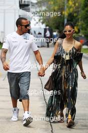 Lewis Hamilton (GBR) Mercedes AMG F1 with his girlfriend Nicole Scherzinger (USA) Singer. 24.03.2013. Formula 1 World Championship, Rd 2, Malaysian Grand Prix, Sepang, Malaysia, Sunday.