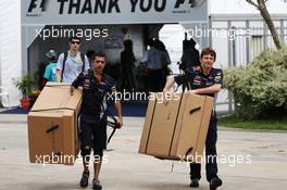 Red Bull Racing mechanics with big cardboard boxes. 24.03.2013. Formula 1 World Championship, Rd 2, Malaysian Grand Prix, Sepang, Malaysia, Sunday.