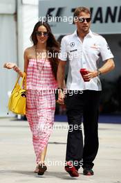 Jenson Button (GBR) McLaren with girlfriend Jessica Michibata (JPN). 24.03.2013. Formula 1 World Championship, Rd 2, Malaysian Grand Prix, Sepang, Malaysia, Sunday.