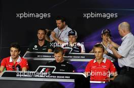 The FIA Press Conference (From back row (L to R)): Giedo van der Garde (NLD) Caterham F1 Team; Valtteri Bottas (FIN) Williams; Esteban Gutierrez (MEX) Sauber; Jules Bianchi (FRA) Marussia F1 Team; Kimi Raikkonen (FIN) Lotus F1 Team; Max Chilton (GBR) Marussia F1 Team. 21.03.2013. Formula 1 World Championship, Rd 2, Malaysian Grand Prix, Sepang, Malaysia, Thursday.