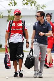 Felipe Massa (BRA) Ferrari with Nicolas Todt (FRA) Driver Manager. 21.03.2013. Formula 1 World Championship, Rd 2, Malaysian Grand Prix, Sepang, Malaysia, Thursday.