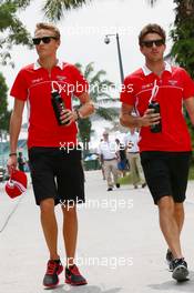 (L to R): Max Chilton (GBR) Marussia F1 Team with team mate Jules Bianchi (FRA) Marussia F1 Team. 21.03.2013. Formula 1 World Championship, Rd 2, Malaysian Grand Prix, Sepang, Malaysia, Thursday.