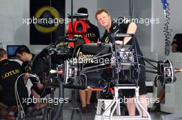 Lotus F1 E21 is prepared in the pits. 21.03.2013. Formula 1 World Championship, Rd 2, Malaysian Grand Prix, Sepang, Malaysia, Thursday.