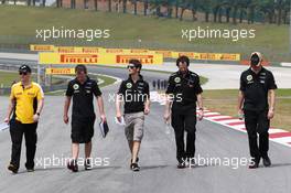 Romain Grosjean (FRA) Lotus F1 Team walks the circuit. 21.03.2013. Formula 1 World Championship, Rd 2, Malaysian Grand Prix, Sepang, Malaysia, Thursday.
