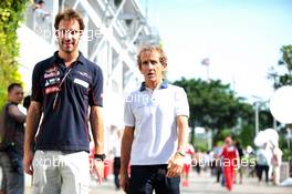 (L to R): Jean-Eric Vergne (FRA) Scuderia Toro Rosso with Alain Prost (FRA). 20.09.2013. Formula 1 World Championship, Rd 13, Singapore Grand Prix, Singapore, Singapore, Practice Day.