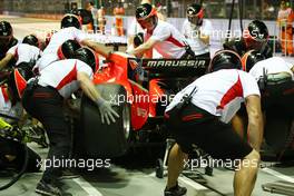 Jules Bianchi (FRA) Marussia F1 Team MR02 practices a pit stop. 20.09.2013. Formula 1 World Championship, Rd 13, Singapore Grand Prix, Singapore, Singapore, Practice Day.