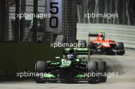 Charles Pic (FRA) Caterham CT03 leads Max Chilton (GBR) Marussia F1 Team MR02. 20.09.2013. Formula 1 World Championship, Rd 13, Singapore Grand Prix, Singapore, Singapore, Practice Day.