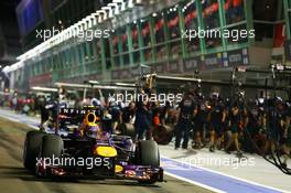 Mark Webber (AUS) Red Bull Racing RB9 leaves the pits. 20.09.2013. Formula 1 World Championship, Rd 13, Singapore Grand Prix, Singapore, Singapore, Practice Day.