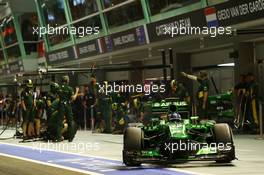 Charles Pic (FRA) Caterham CT03 leaves the pits. 20.09.2013. Formula 1 World Championship, Rd 13, Singapore Grand Prix, Singapore, Singapore, Practice Day.