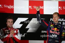 Fernando Alonso (ESP) Ferrari and Sebastian Vettel (GER) Red Bull Racing. 22.09.2013. Formula 1 World Championship, Rd 13, Singapore Grand Prix, Singapore, Singapore, Race Day.