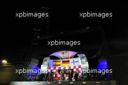 The podium (L to R): Fernando Alonso (ESP) Ferrari, second; Sebastian Vettel (GER) Red Bull Racing, race winner; Kimi Raikkonen (FIN) Lotus F1 Team, third.. 22.09.2013. Formula 1 World Championship, Rd 13, Singapore Grand Prix, Singapore, Singapore, Race Day.