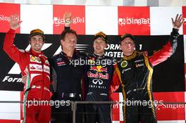 1st place Sebastian Vettel (GER) Red Bull Racing, 2nd Fernando Alonso (ESP) Ferrari and 3rd place Kimi Raikkonen (FIN) Lotus F1 Team. 22.09.2013. Formula 1 World Championship, Rd 13, Singapore Grand Prix, Singapore, Singapore, Race Day.