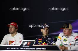 The FIA Press Conference (L to R): Fernando Alonso (ESP) Ferrari, second; Sebastian Vettel (GER) Red Bull Racing, race winner; Kimi Raikkonen (FIN) Lotus F1 Team, third. 22.09.2013. Formula 1 World Championship, Rd 13, Singapore Grand Prix, Singapore, Singapore, Race Day.