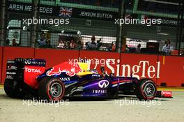 Race winner Sebastian Vettel (GER) Red Bull Racing RB9 celebrates at the end of the race. 22.09.2013. Formula 1 World Championship, Rd 13, Singapore Grand Prix, Singapore, Singapore, Race Day.