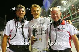 (L to R): Graeme Lowdon (GBR) Marussia F1 Team Chief Executive Officer with Max Chilton (GBR) Marussia F1 Team and Andy Webb (GBR) Marussia F1 Team CEO. 21.09.2013. Formula 1 World Championship, Rd 13, Singapore Grand Prix, Singapore, Singapore, Qualifying Day.