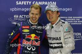 pole for Sebastian Vettel (GER) Red Bull Racing, 2nd for Nico Rosberg (GER) Mercedes AMG F1. 21.09.2013. Formula 1 World Championship, Rd 13, Singapore Grand Prix, Singapore, Singapore, Qualifying Day.