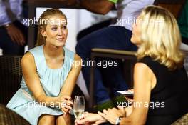 Jennifer Becks (GER) (Left) girlfriend of Adrian Sutil (GER) Sahara Force India F1. 21.09.2013. Formula 1 World Championship, Rd 13, Singapore Grand Prix, Singapore, Singapore, Qualifying Day.