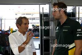 Alain Prost (FRA) and Giedo van der Garde (NDL), Caterham F1 Team  22.09.2013. Formula 1 World Championship, Rd 13, Singapore Grand Prix, Singapore, Singapore, Race Day.