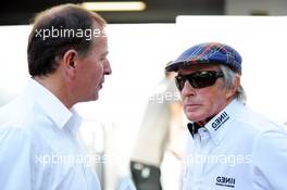 (L to R): Martin Brundle (GBR) Sky Sports Commentator with Jackie Stewart (GBR). 22.09.2013. Formula 1 World Championship, Rd 13, Singapore Grand Prix, Singapore, Singapore, Race Day.