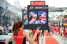 Grid girl for Max Chilton (GBR) Marussia F1 Team. 22.09.2013. Formula 1 World Championship, Rd 13, Singapore Grand Prix, Singapore, Singapore, Race Day.