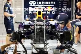 Red Bull Racing RB9 is prepared in the pits. 19.09.2013. Formula 1 World Championship, Rd 13, Singapore Grand Prix, Singapore, Singapore, Preparation Day.
