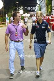 (L to R): Sebastian Vettel (GER) Red Bull Racing with Christian Horner (GBR) Red Bull Racing Team Principal. 19.09.2013. Formula 1 World Championship, Rd 13, Singapore Grand Prix, Singapore, Singapore, Preparation Day.