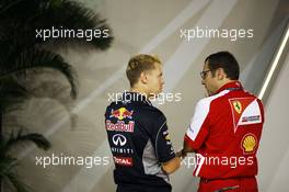 (L to R): Sebastian Vettel (GER) Red Bull Racing with Stefano Domenicali (ITA) Ferrari General Director. 19.09.2013. Formula 1 World Championship, Rd 13, Singapore Grand Prix, Singapore, Singapore, Preparation Day.