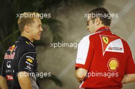 (L to R): Sebastian Vettel (GER) Red Bull Racing with Stefano Domenicali (ITA) Ferrari General Director. 19.09.2013. Formula 1 World Championship, Rd 13, Singapore Grand Prix, Singapore, Singapore, Preparation Day.
