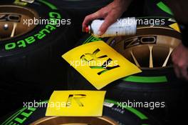 Pirelli tyres for Kimi Raikkonen (FIN) Lotus F1 Team marked up. 19.09.2013. Formula 1 World Championship, Rd 13, Singapore Grand Prix, Singapore, Singapore, Preparation Day.