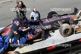 The Scuderia Toro Rosso STR8 of Daniil Kvyat (RUS) Scuderia Toro Rosso Test Driver is recovered back to the pits on the back of a truck. 19.07.2013. Formula One Young Drivers Test, Day 3, Silverstone, England.